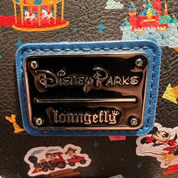 Loungefly Disney Parks Disneyland Ride all over Icon Mini Backpack NWT - Picture 4 of 8